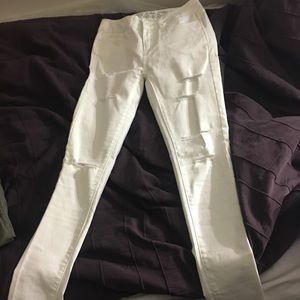 White skinny jeans with rips